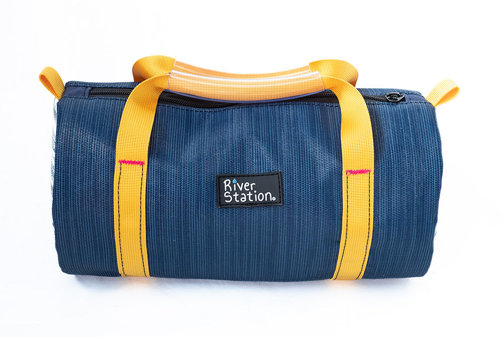 Blue and yellow mesh bag for whitewater rafting