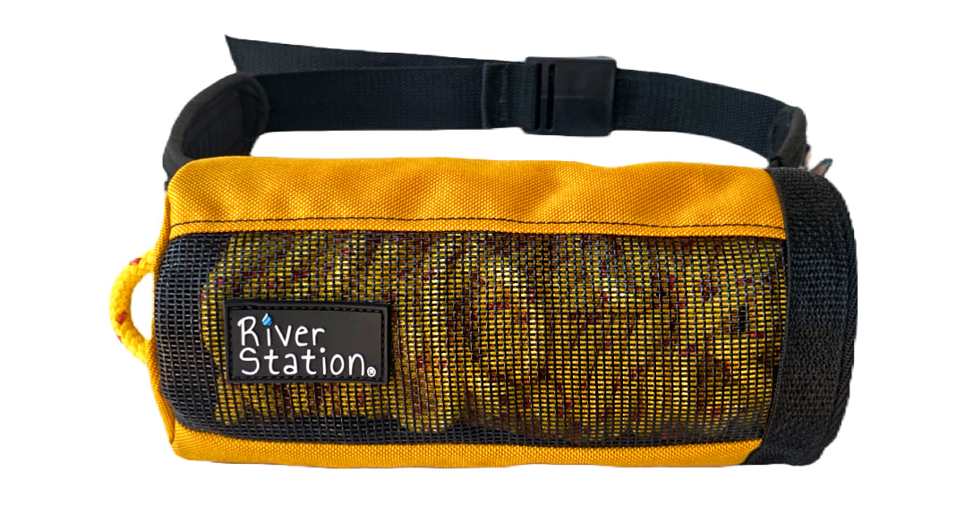 Gold waist throw bag for whitewater rafting and kayaking.