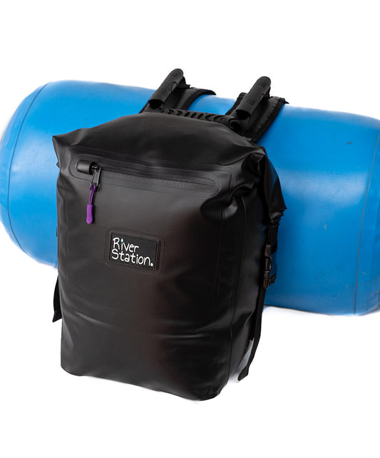 Black dry bag for whitewater rafting. 