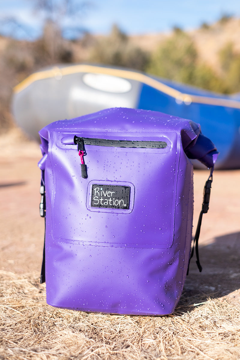 Purple dry bag for rafting. 