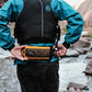 Gold waist throw bag for raft guiding.