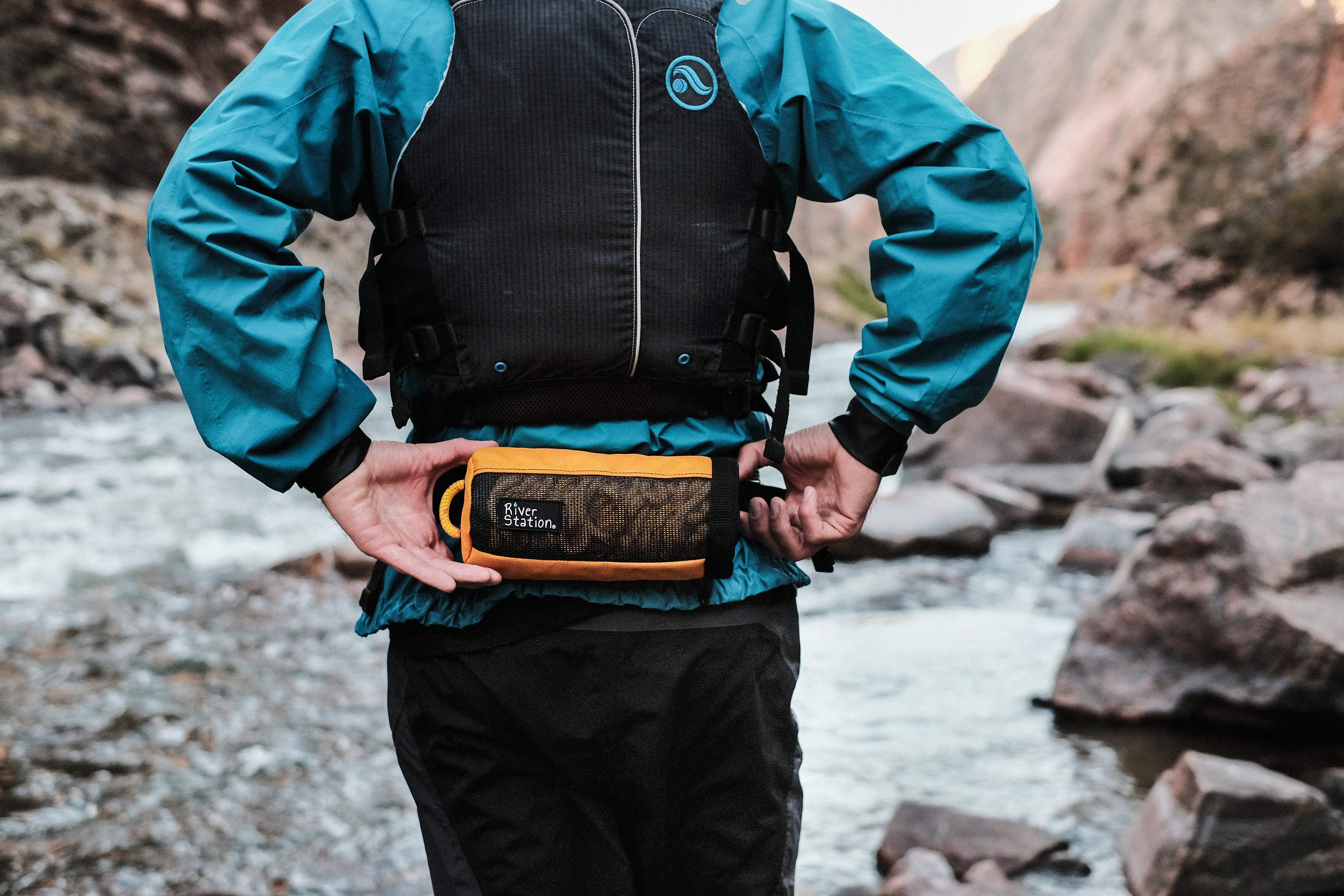 Gold waist throw bag for raft guiding.